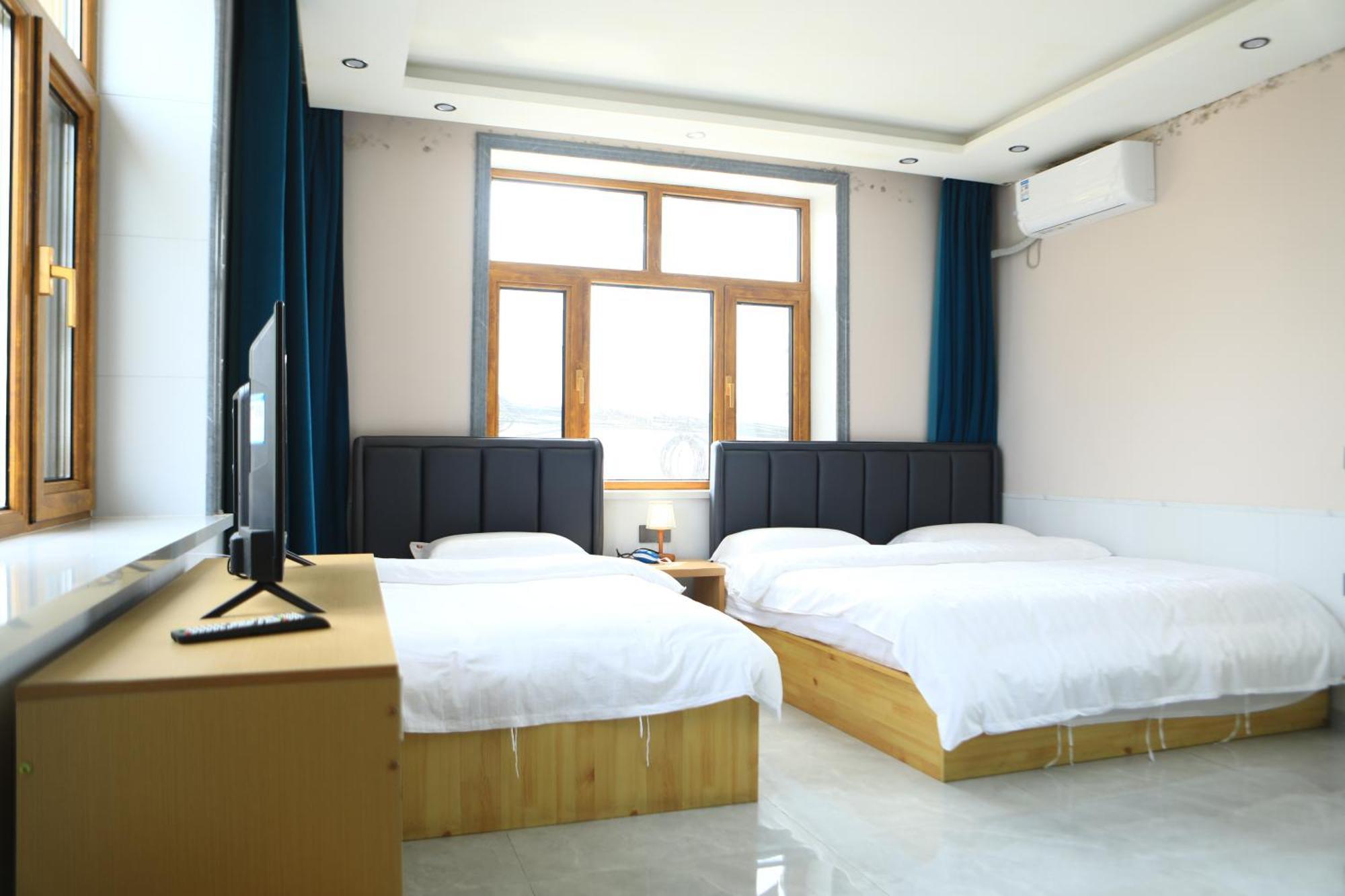 Hongge Hotel - Harbin Taiping Airport Buitenkant foto